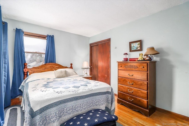 31 Branch Hill Rd, Preston, CT 06365 - bedroom featuring light wood-type flooring and a closet