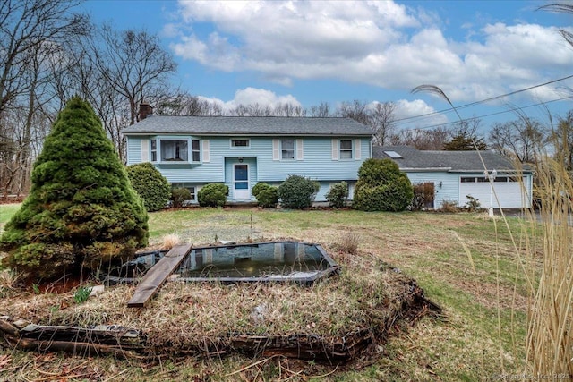 31 Branch Hill Rd, Preston, CT 06365 - back of house featuring a chimney, a yard, and a garage