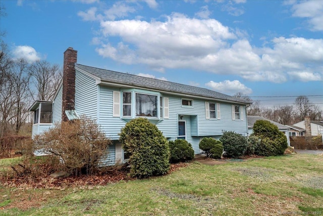 31 Branch Hill Rd, Preston, CT 06365 - view of front of house with a chimney and a front yard