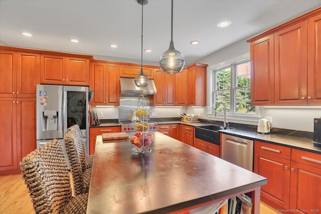 100 Round Hill Rd, Middletown, CT 06457 - kitchen featuring appliances with stainless steel finishes, extractor fan, dark countertops, recessed lighting, and hanging light fixtures