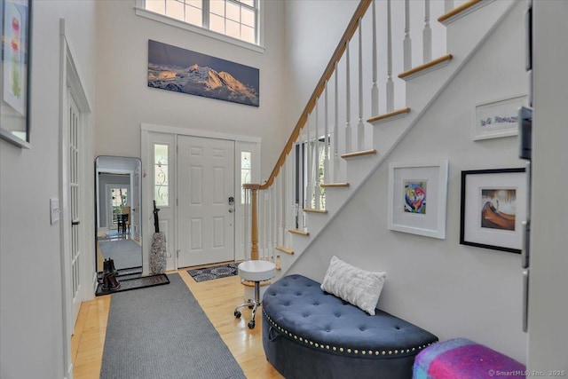 100 Round Hill Rd, Middletown, CT 06457 - foyer entrance with a high ceiling, wood finished floors, and stairs