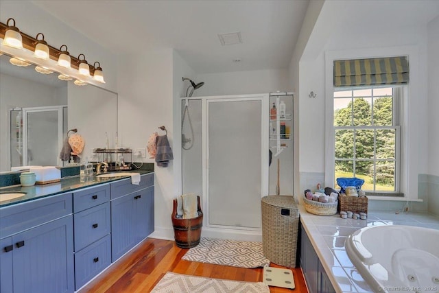 100 Round Hill Rd, Middletown, CT 06457 - full bath featuring a stall shower, healthy amount of natural light, and double vanity