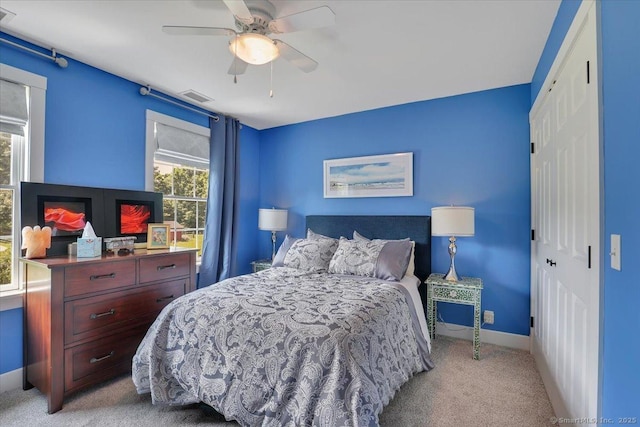 100 Round Hill Rd, Middletown, CT 06457 - bedroom with light carpet, a closet, a ceiling fan, and baseboards