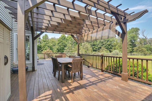100 Round Hill Rd, Middletown, CT 06457 - wooden deck featuring outdoor dining space, a pergola, and view of wooded area