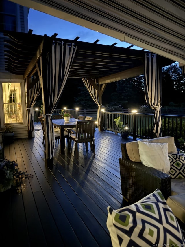 100 Round Hill Rd, Middletown, CT 06457 - deck at twilight featuring a pergola and outdoor dining space
