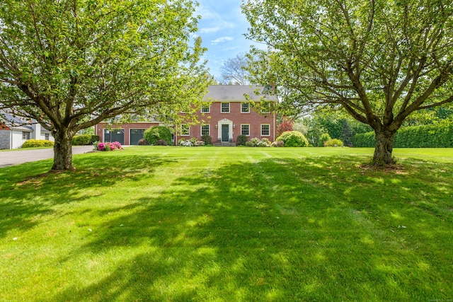 116 Thornbush Rd, Wethersfield, CT 06109 - view of front of home with a front lawn and brick siding