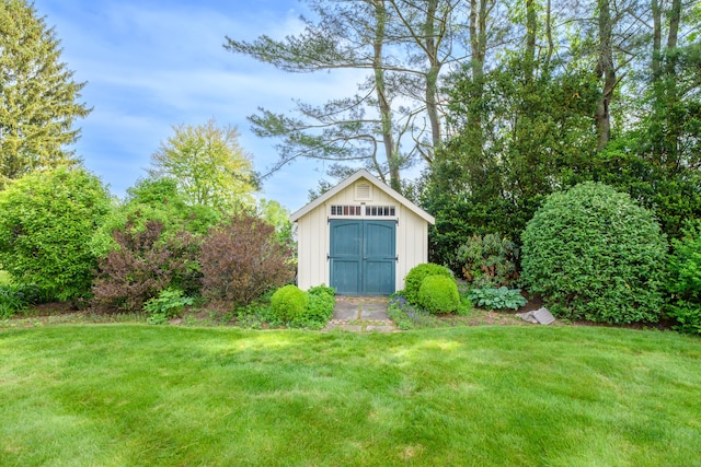 116 Thornbush Rd, Wethersfield, CT 06109 - view of grassy yard with a storage shed and an outbuilding