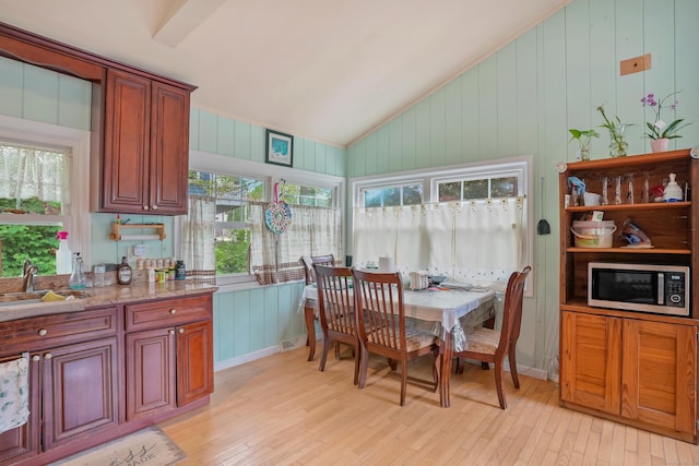 24 Cornell Rd, Danbury, CT 06811 - dining space with lofted ceiling, light wood finished floors, and healthy amount of natural light