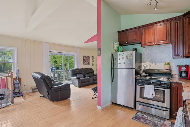24 Cornell Rd, Danbury, CT 06811 - kitchen with stainless steel appliances, open floor plan, light wood finished floors, decorative backsplash, and lofted ceiling