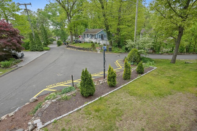 24 Cornell Rd, Danbury, CT 06811 - view of asphalt street with view of scattered trees