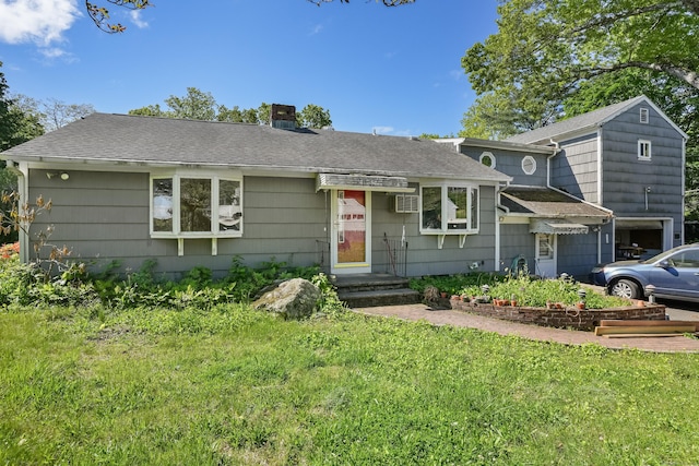 1 Cedar Rd, Danbury, CT 06811 - split level home with a chimney, a front lawn, roof with shingles, and a garage