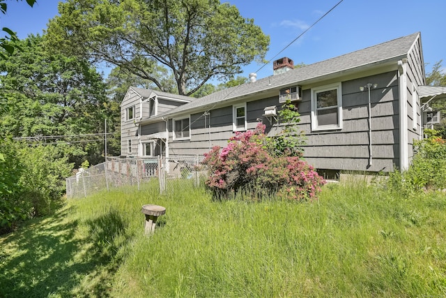 1 Cedar Rd, Danbury, CT 06811 - rear view of house with a chimney