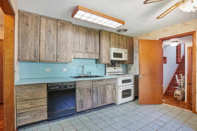 1 Cedar Rd, Danbury, CT 06811 - kitchen with white appliances, a sink, light countertops, a ceiling fan, and light tile patterned floors