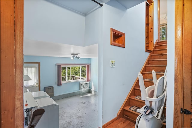 1 Cedar Rd, Danbury, CT 06811 - stairs with independent washer and dryer, baseboards, and concrete flooring