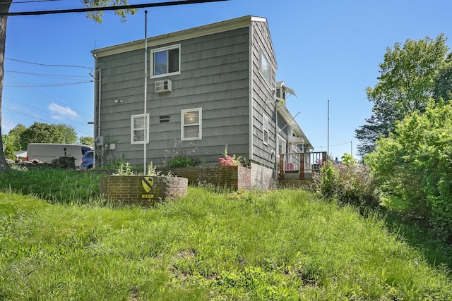 1 Cedar Rd, Danbury, CT 06811 - view of home's exterior featuring a wall unit AC