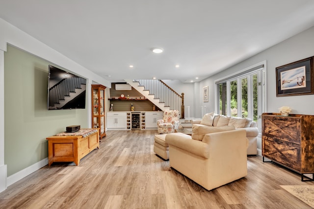3 Lynns Corner Rd, Woodbury, CT 06798 - living room with a dry bar, stairs, light wood-style floors, and recessed lighting