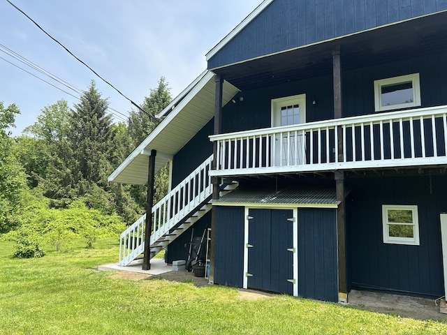 3 Lynns Corner Rd, Woodbury, CT 06798 - view of side of home featuring stairs and a lawn