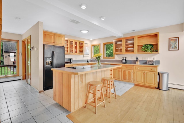 33 Erdoni Rd, Columbia, CT 06237 - kitchen featuring black appliances, baseboard heating, a kitchen bar, light brown cabinets, and recessed lighting