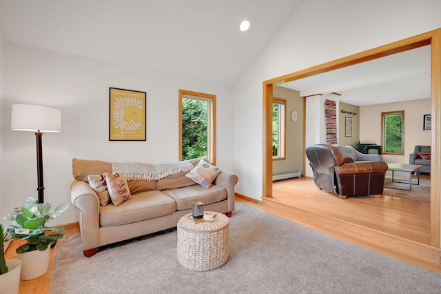 33 Erdoni Rd, Columbia, CT 06237 - living area with baseboard heating, healthy amount of natural light, wood finished floors, recessed lighting, and baseboards