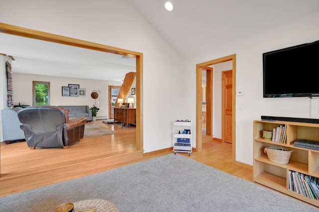 33 Erdoni Rd, Columbia, CT 06237 - living room with wood finished floors, lofted ceiling, baseboards, and recessed lighting