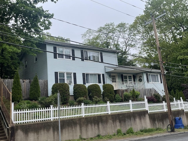 1315 Hamilton Ave, Waterbury, CT 06706 - view of front facade with a fenced front yard and covered porch