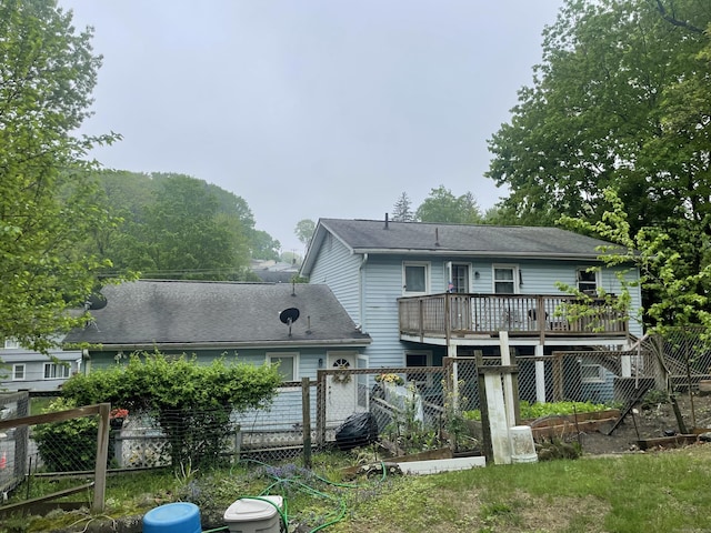 1315 Hamilton Ave, Waterbury, CT 06706 - rear view of house featuring a deck and fence