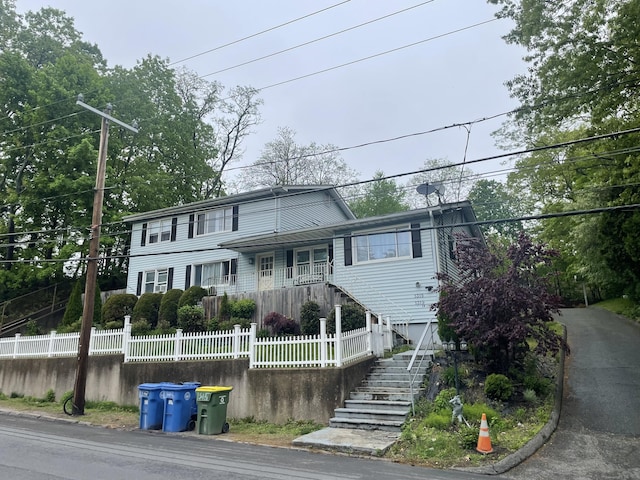 1315 Hamilton Ave, Waterbury, CT 06706 - view of front of house with fence and stairs