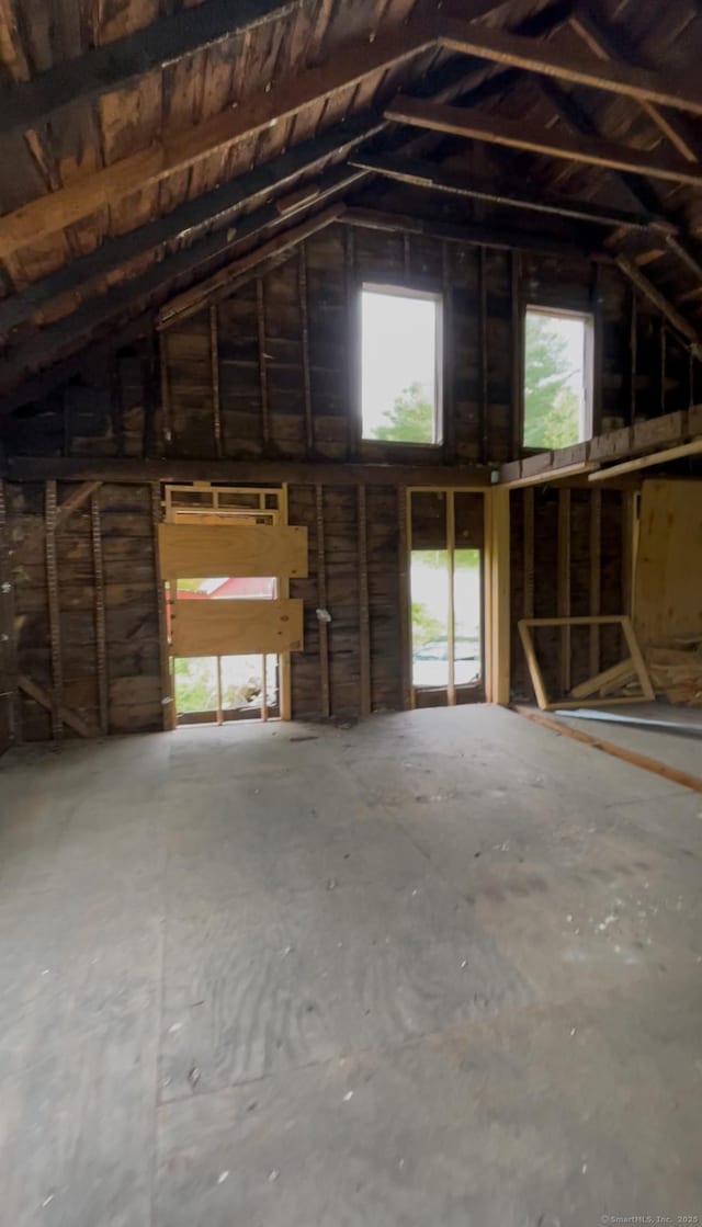 misc room featuring lofted ceiling