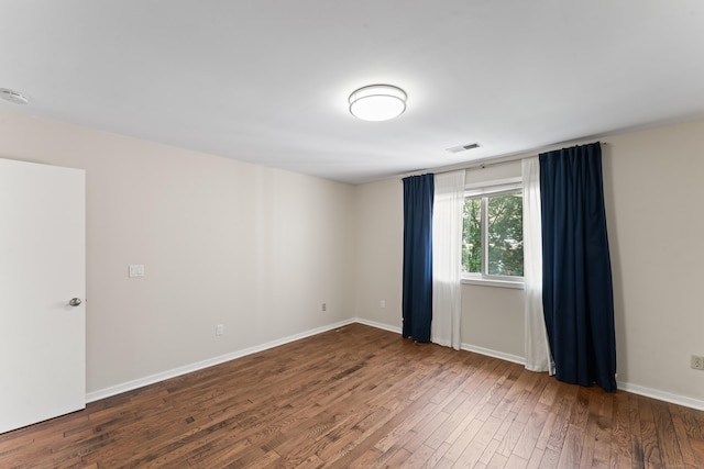 101 Grove St Apt 19, Stamford, CT 06901 - empty room featuring hardwood / wood-style floors and baseboards