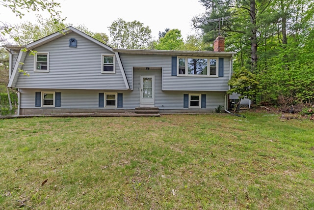 9 Berkshire Dr, East Hampton, CT 06424 - bi-level home with a chimney and a front lawn