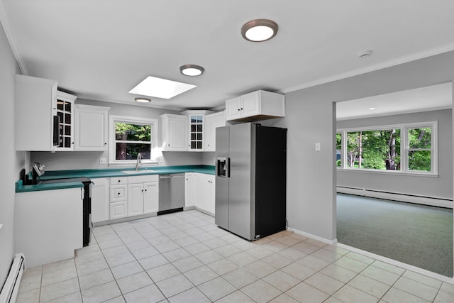 6 Marbil Rd, Danbury, CT 06811 - kitchen with stainless steel appliances, a baseboard heating unit, a sink, a skylight, and crown molding