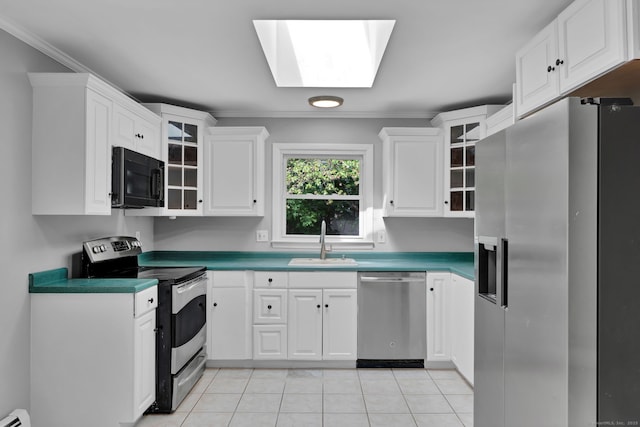 6 Marbil Rd, Danbury, CT 06811 - kitchen with stainless steel appliances, a sink, white cabinetry, light tile patterned flooring, and crown molding
