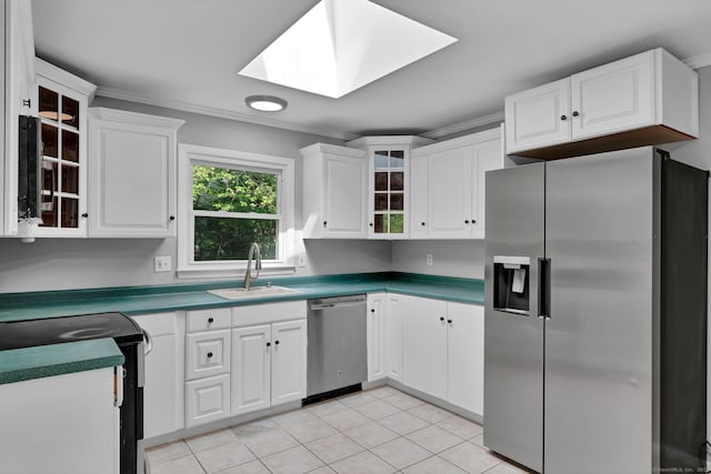 6 Marbil Rd, Danbury, CT 06811 - kitchen featuring stainless steel appliances, a sink, a skylight, ornamental molding, and white cabinets