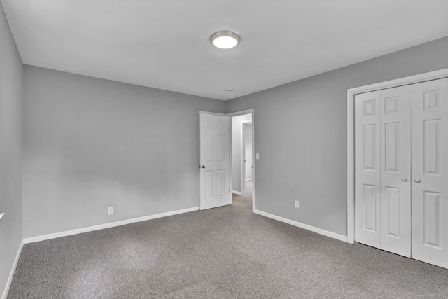 6 Marbil Rd, Danbury, CT 06811 - unfurnished bedroom with carpet flooring, a closet, and baseboards