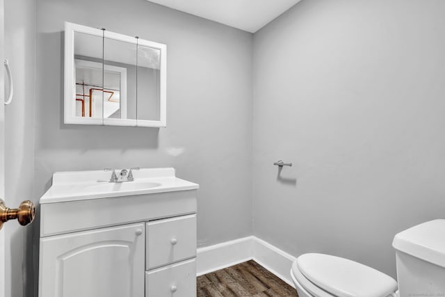 6 Marbil Rd, Danbury, CT 06811 - bathroom featuring toilet, wood finished floors, vanity, and baseboards