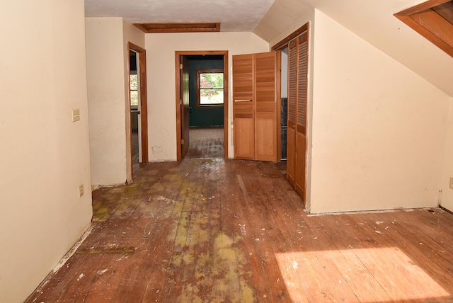1152 Hartford Tpke, Vernon, CT 06066 - corridor with hardwood / wood-style flooring and lofted ceiling
