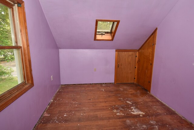 1152 Hartford Tpke, Vernon, CT 06066 - bonus room with a skylight, vaulted ceiling, and wood-type flooring