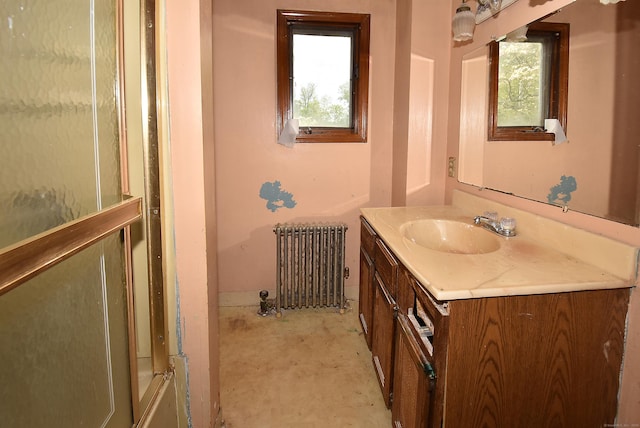 1152 Hartford Tpke, Vernon, CT 06066 - bathroom featuring radiator, concrete flooring, and vanity