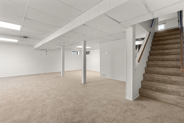 110 Hesse Rd, Hamden, CT 06517 - basement with stairs, carpet, and a paneled ceiling