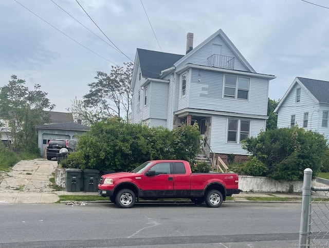 92 Alice St, Bridgeport, CT 06606 - view of front facade with a chimney