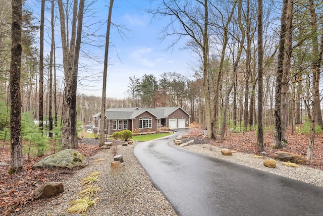 108 Lohse Rd, Willington, CT 06279 - ranch-style home featuring a garage and driveway