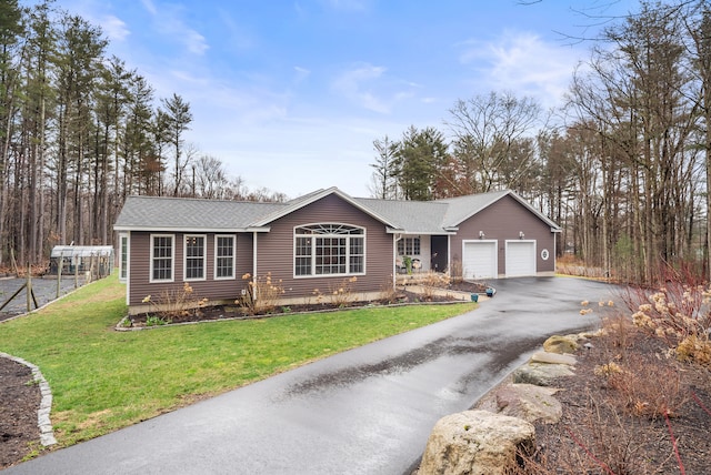 108 Lohse Rd, Willington, CT 06279 - ranch-style home with driveway, a garage, a front lawn, and a shingled roof