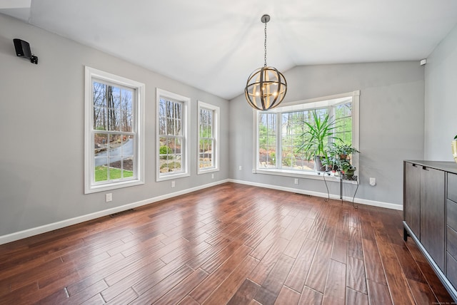 108 Lohse Rd, Willington, CT 06279 - unfurnished dining area featuring healthy amount of natural light, a chandelier, dark wood finished floors, and vaulted ceiling