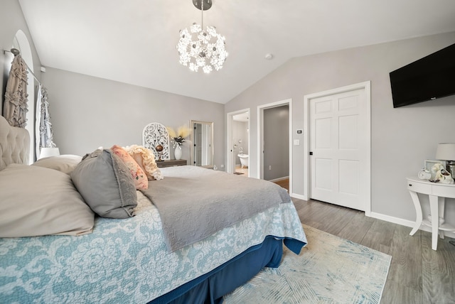 108 Lohse Rd, Willington, CT 06279 - bedroom featuring lofted ceiling, a chandelier, wood finished floors, baseboards, and ensuite bathroom
