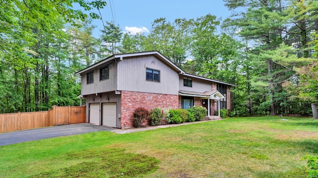 1 Nod Brook Dr, Simsbury, CT 06070 - view of front of property featuring asphalt driveway, brick siding, and an attached garage