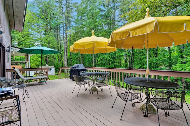 1 Nod Brook Dr, Simsbury, CT 06070 - deck featuring outdoor dining area, a grill, and view of wooded area