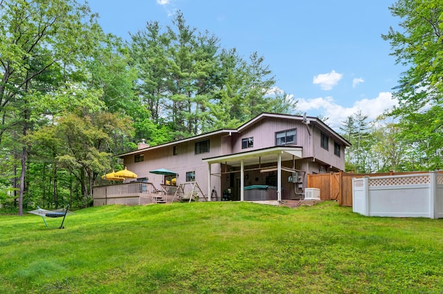 1 Nod Brook Dr, Simsbury, CT 06070 - back of property featuring a deck and a hot tub