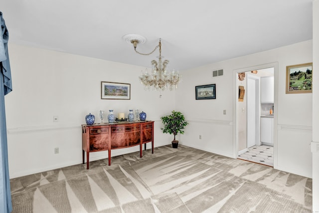 1 Nod Brook Dr, Simsbury, CT 06070 - foyer entrance featuring light carpet and a chandelier