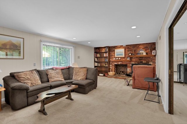 1 Nod Brook Dr, Simsbury, CT 06070 - carpeted living room featuring a brick fireplace, built in shelves, and recessed lighting