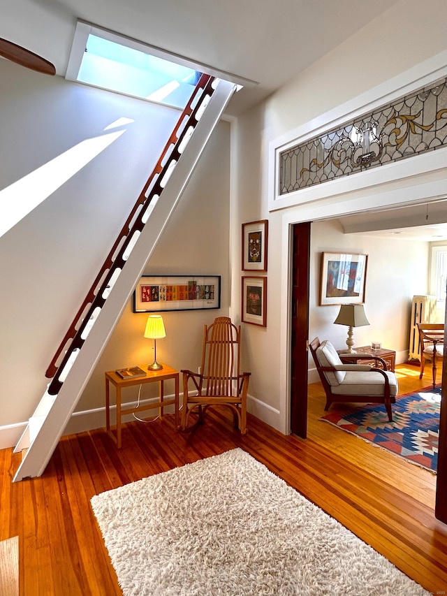27 Church St, Groton, CT 06340 - sitting room featuring wood-type flooring and stairs